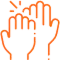 Multiple hands raised together in unity, representing teamwork and community support in dental care.