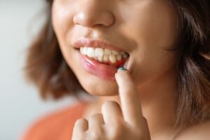 Red swollen gums indicating advanced gingivitis and urgent dental care needs